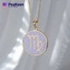 Collar Virgo de esmalte blando sobre un vibrante fondo morado, que resalta su intrincado diseño zodiacal.