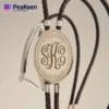 Elegant leather bracelet showcasing a custom monogram, perfect for adding a personal touch to any outfit.